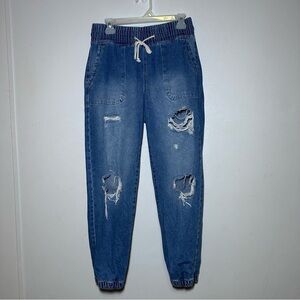 Celebrity Pink Distressed Denim Jogger Jeans
Size Medium